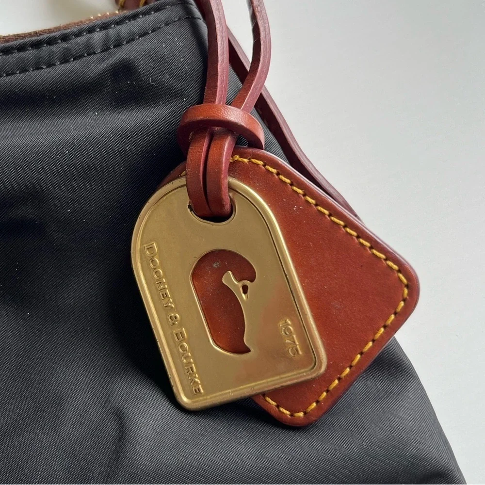 Dooney & Bourke Black Tote with Brown Leather and Gold Tag - Picture 4 of 13